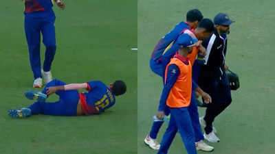 Wicket celebration gone wrong! Bowler horribly twists ankle, shouldered off the field. Watch